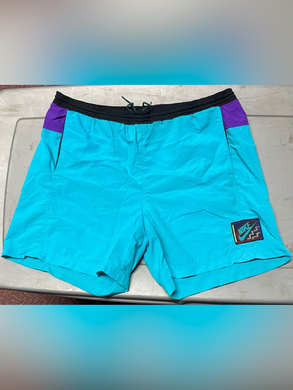 Nike Men's Turquoise Vintage Swim Trunks with Black Waistband and Purple Accents